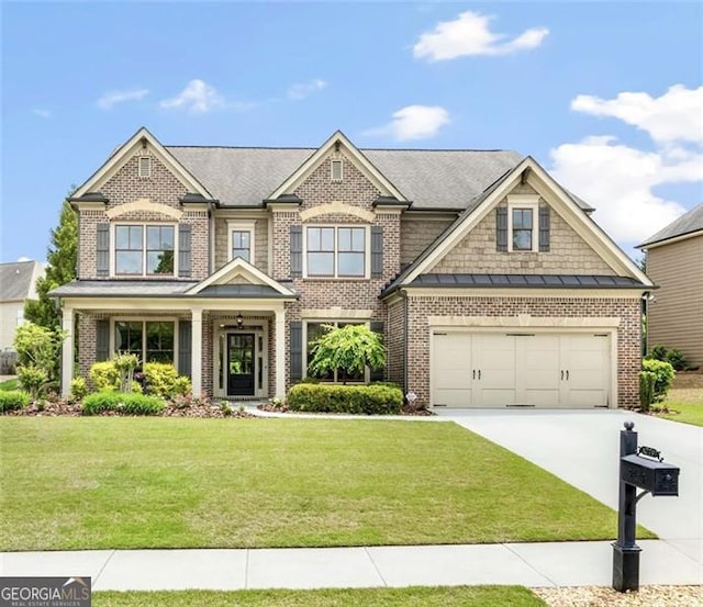 craftsman-style house featuring brick siding, a front lawn, driveway, and a standing seam roof