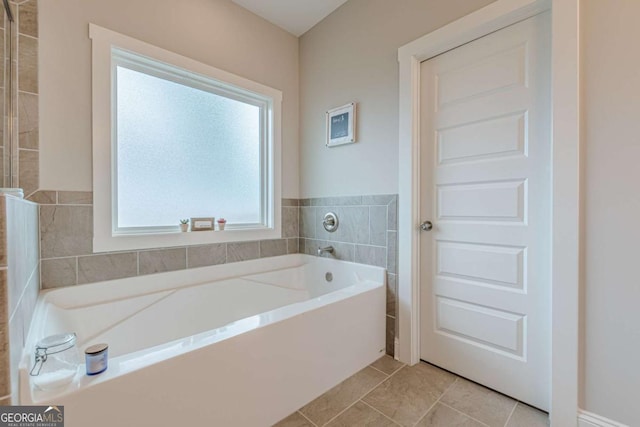 21 E Field St, Newnan, GA 30263 - full bathroom with tile patterned floors and a garden tub