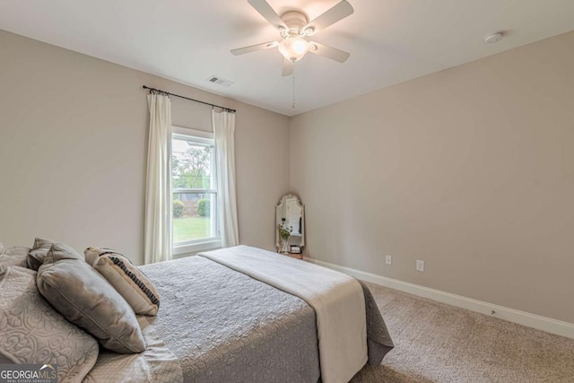 21 E Field St, Newnan, GA 30263 - carpeted bedroom with baseboards, visible vents, and ceiling fan