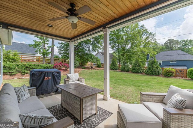21 E Field St, Newnan, GA 30263 - view of patio featuring area for grilling, fence, a ceiling fan, and an outdoor hangout area