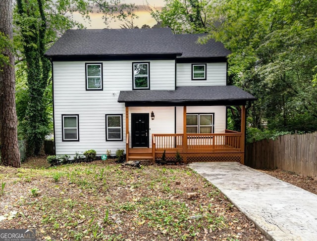 398 NW Wester Blvd, Atlanta, GA 30314 - view of front of house with a porch, fence, and a shingled roof