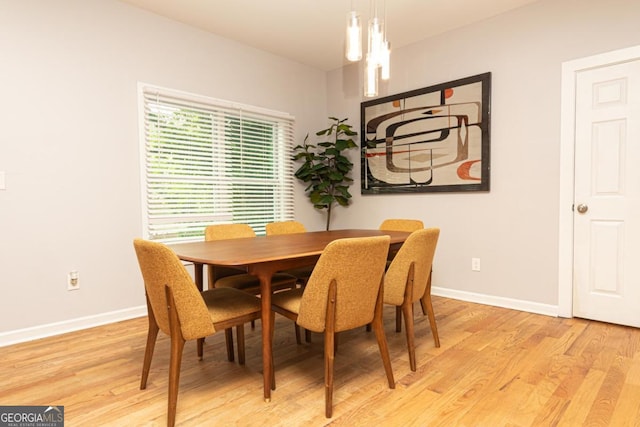398 NW Wester Blvd, Atlanta, GA 30314 - dining space with baseboards and light wood-type flooring
