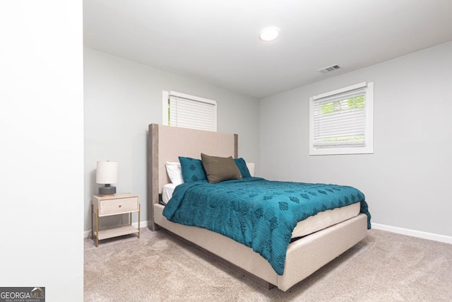 398 NW Wester Blvd, Atlanta, GA 30314 - bedroom with baseboards, carpet, and visible vents