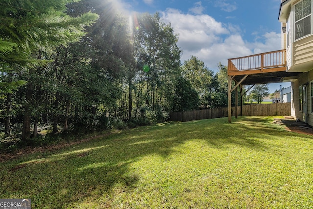 981 Charles Hall Dr, Dacula, GA 30019 - view of yard with fence and a wooden deck