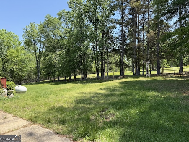 7260 Cox Rd, Cumming, GA 30028 - view of yard featuring fence