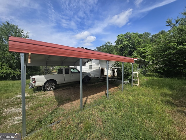 view of parking featuring a detached carport