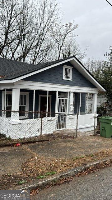 923 Ira St SW, Atlanta, GA 30310 - bungalow-style house with a porch and roof with shingles