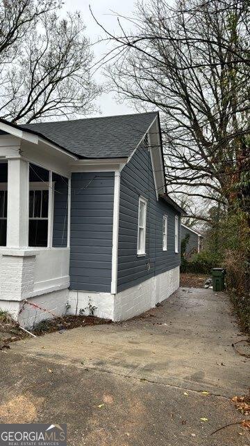 923 Ira St SW, Atlanta, GA 30310 - view of property exterior featuring a shingled roof