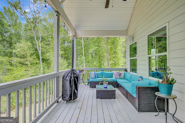 34 Oakleigh Trl, Newnan, GA 30265 - deck with a ceiling fan and an outdoor hangout area