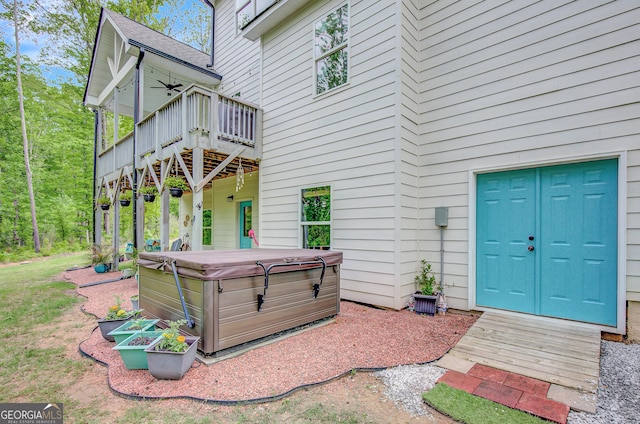 34 Oakleigh Trl, Newnan, GA 30265 - entrance to property with ceiling fan, a hot tub, and a deck