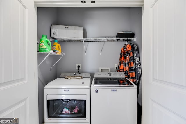 102 Wooded Glen Ln, Carrollton, GA 30117 - laundry area with laundry area and washing machine and dryer