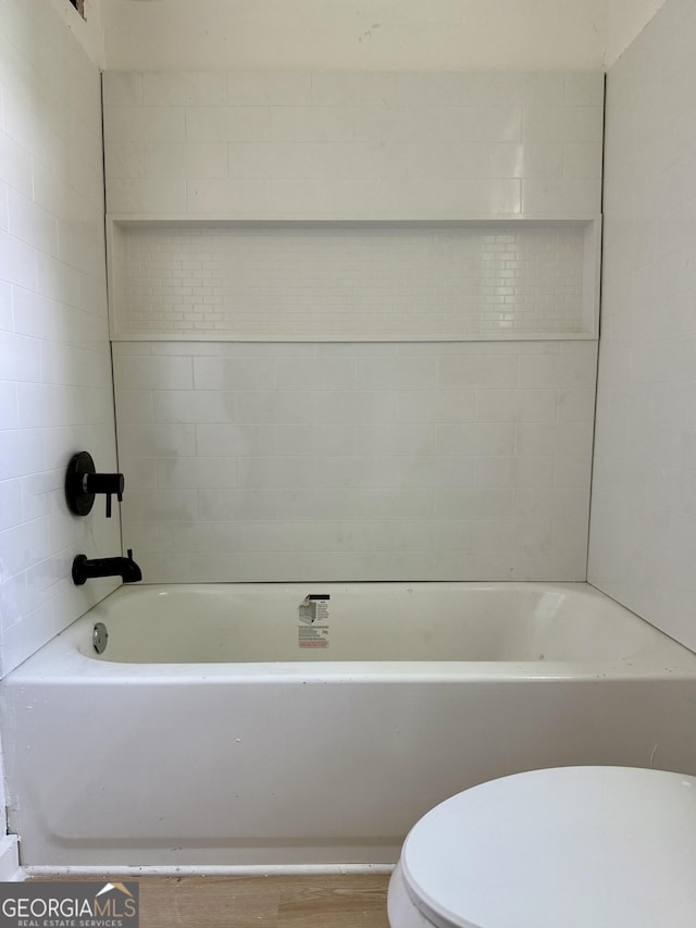 808 Center St, Macon, GA 31217 - bathroom featuring toilet and a tub to relax in