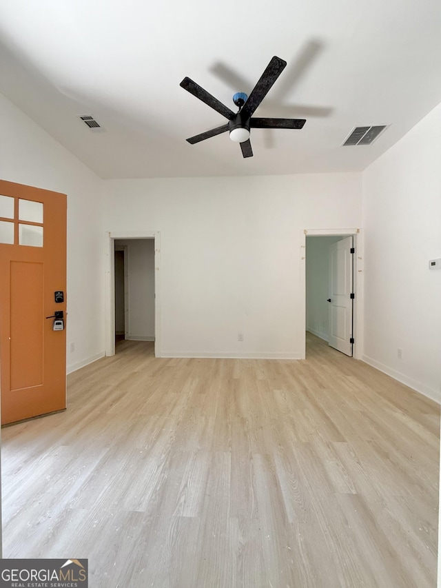 808 Center St, Macon, GA 31217 - unfurnished living room with light wood finished floors, a ceiling fan, baseboards, and vaulted ceiling