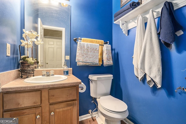 436 Berkshire Pl, Fairburn, GA 30213 - bathroom with toilet, vanity, and baseboards