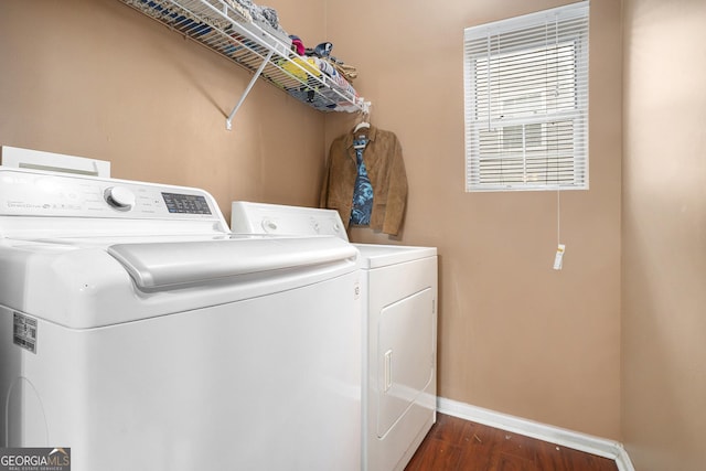 436 Berkshire Pl, Fairburn, GA 30213 - laundry room featuring washer and dryer, dark wood-type flooring, and baseboards
