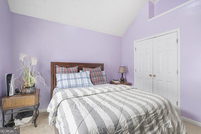 436 Berkshire Pl, Fairburn, GA 30213 - carpeted bedroom featuring vaulted ceiling, baseboards, and a closet