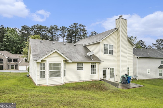 436 Berkshire Pl, Fairburn, GA 30213 - back of house with a patio, a yard, a chimney, and a shingled roof