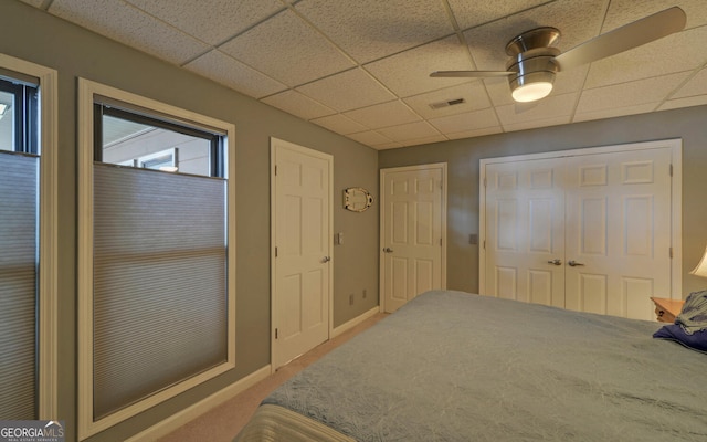 119 Ridgemore Cir, Toccoa, GA 30577 - carpeted bedroom with a drop ceiling, a closet, ceiling fan, and baseboards
