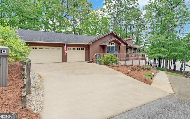 119 Ridgemore Cir, Toccoa, GA 30577 - ranch-style home featuring a garage, concrete driveway, a chimney, and a shingled roof