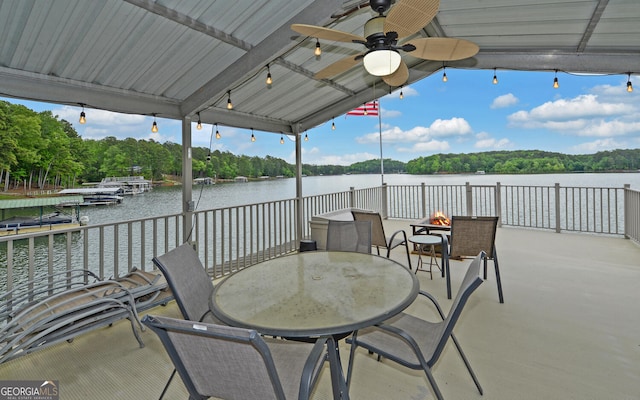 119 Ridgemore Cir, Toccoa, GA 30577 - view of patio featuring ceiling fan, a water view, and outdoor dining space