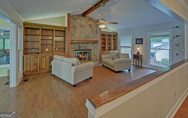 119 Ridgemore Cir, Toccoa, GA 30577 - living room with a ceiling fan, light wood finished floors, plenty of natural light, and a fireplace
