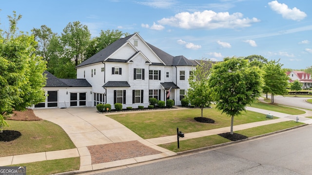 721 Paint Horse Dr, Canton, GA 30115 - view of front of home featuring driveway, a front yard, and a shingled roof