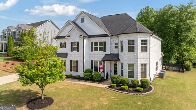 721 Paint Horse Dr, Canton, GA 30115 - view of property featuring central AC unit and brick siding