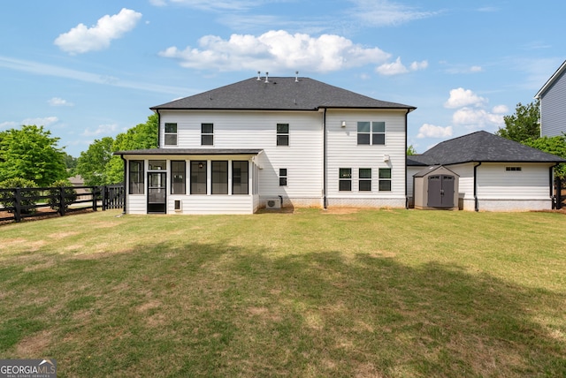 721 Paint Horse Dr, Canton, GA 30115 - back of house featuring a sunroom, a shed, an outdoor structure, and a shingled roof