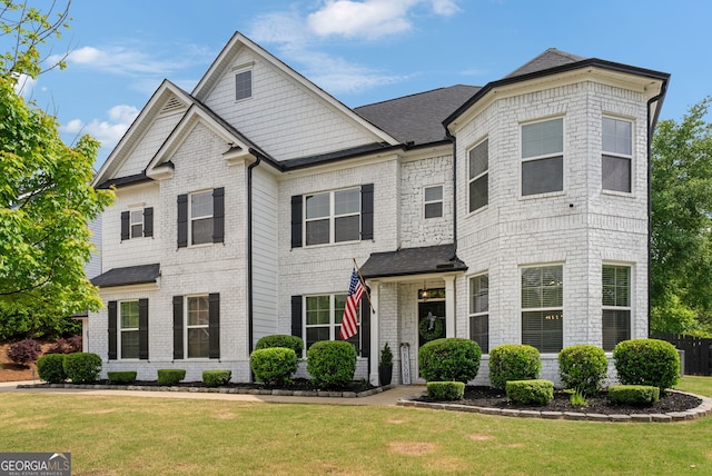 721 Paint Horse Dr, Canton, GA 30115 - view of front of home featuring a front yard, brick siding, and a shingled roof
