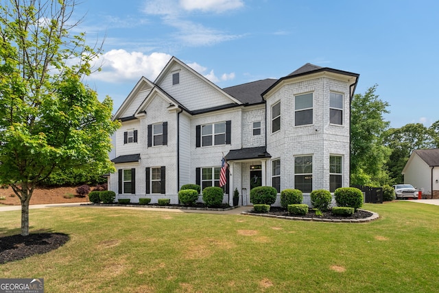 721 Paint Horse Dr, Canton, GA 30115 - view of front of home featuring a front yard and brick siding
