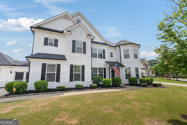 721 Paint Horse Dr, Canton, GA 30115 - townhome / multi-family property featuring a front lawn and brick siding