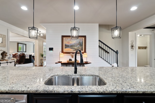 721 Paint Horse Dr, Canton, GA 30115 - kitchen featuring a sink, light stone counters, pendant lighting, recessed lighting, and dark cabinets