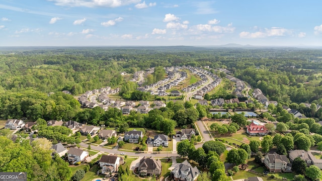 721 Paint Horse Dr, Canton, GA 30115 - aerial view of property's location with a forest and nearby suburban area