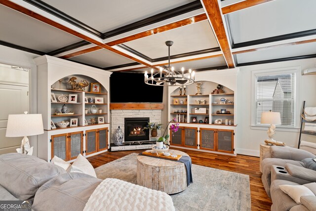 721 Paint Horse Dr, Canton, GA 30115 - living room featuring a chandelier, coffered ceiling, wood finished floors, a fireplace, and beam ceiling