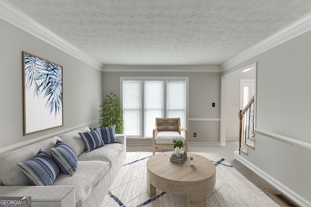 5922 Terrace Lake Pt, Flowery Branch, GA 30542 - carpeted living area with a textured ceiling, stairs, and ornamental molding
