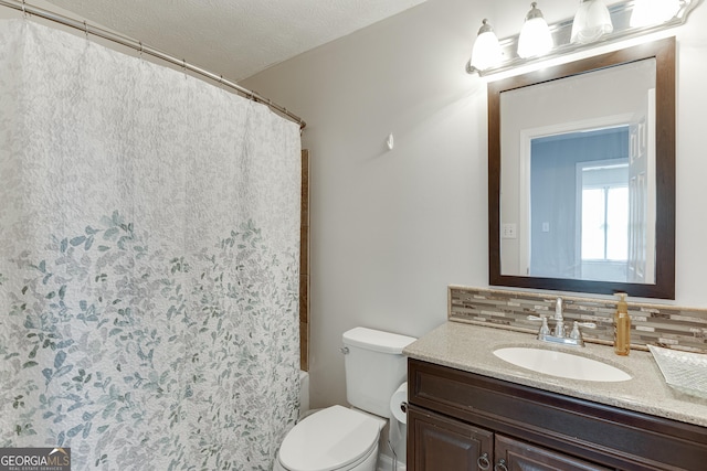 5922 Terrace Lake Pt, Flowery Branch, GA 30542 - full bath with tasteful backsplash, vanity, a textured ceiling, and shower / tub combo