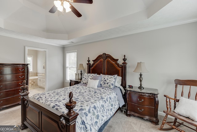 5922 Terrace Lake Pt, Flowery Branch, GA 30542 - bedroom featuring light carpet, a tray ceiling, crown molding, ceiling fan, and ensuite bath