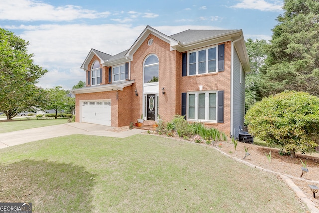 5922 Terrace Lake Pt, Flowery Branch, GA 30542 - view of front facade with concrete driveway, brick siding, a garage, and a front lawn
