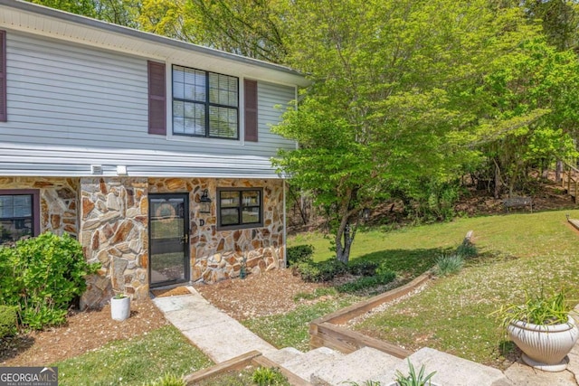 2510 Hidden Cove Ct Unit D, Gainesville, GA 30501 - view of front of property featuring stone siding and a front yard
