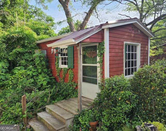 view of outbuilding with an outdoor structure