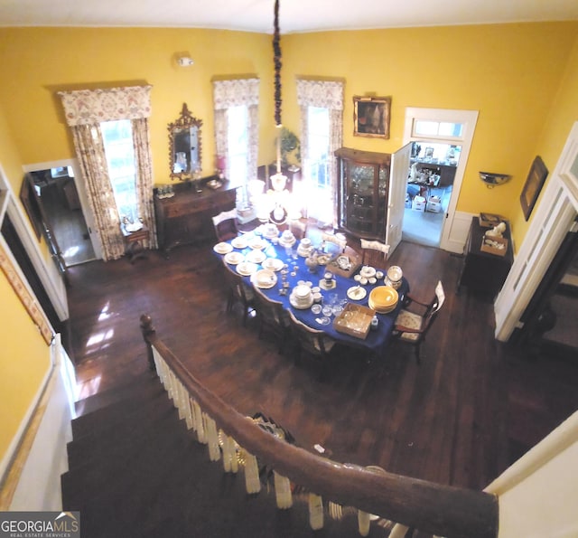 dining area with wood finished floors