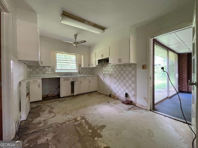 2988 Ramble Ln, Decatur, GA 30033 - kitchen featuring white cabinets, ceiling fan, decorative backsplash, and light countertops
