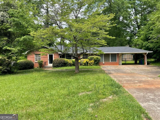 2988 Ramble Ln, Decatur, GA 30033 - ranch-style house featuring brick siding, a carport, a front yard, and concrete driveway