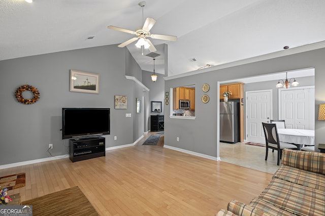 unfurnished living room featuring baseboards, light wood-style flooring, and visible vents