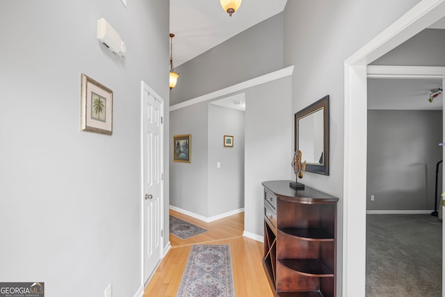interior space with baseboards and light wood-type flooring
