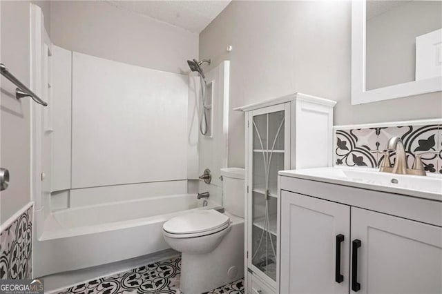1350 Overlook Cv SE, Smyrna, GA 30080 - bathroom with vanity, a textured ceiling, bathtub / shower combination, and toilet