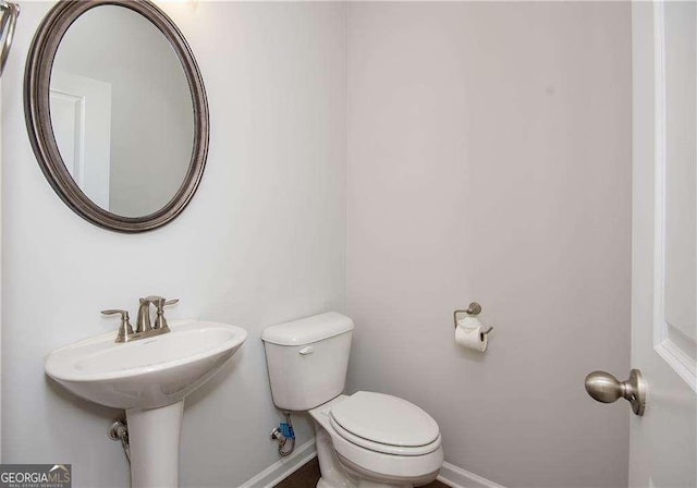 2539 Hedgeway Cir, Kennesaw, GA 30144 - bathroom featuring toilet and baseboards