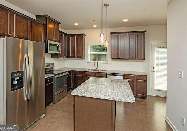2539 Hedgeway Cir, Kennesaw, GA 30144 - kitchen with a sink, appliances with stainless steel finishes, dark brown cabinets, and a wealth of natural light