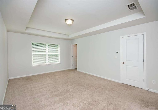 2539 Hedgeway Cir, Kennesaw, GA 30144 - carpeted spare room with baseboards, visible vents, and a raised ceiling