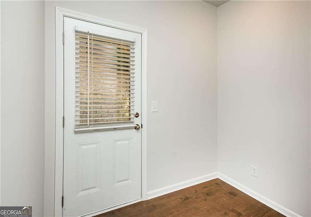 2539 Hedgeway Cir, Kennesaw, GA 30144 - entryway with baseboards and dark wood finished floors